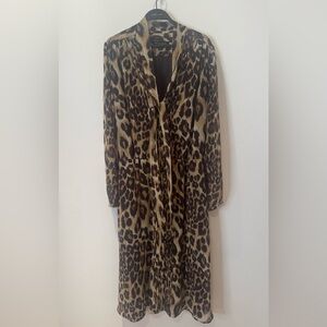 Banana Republic leopard Cocktail Dress with bow detail in front. 
Size M (10)
